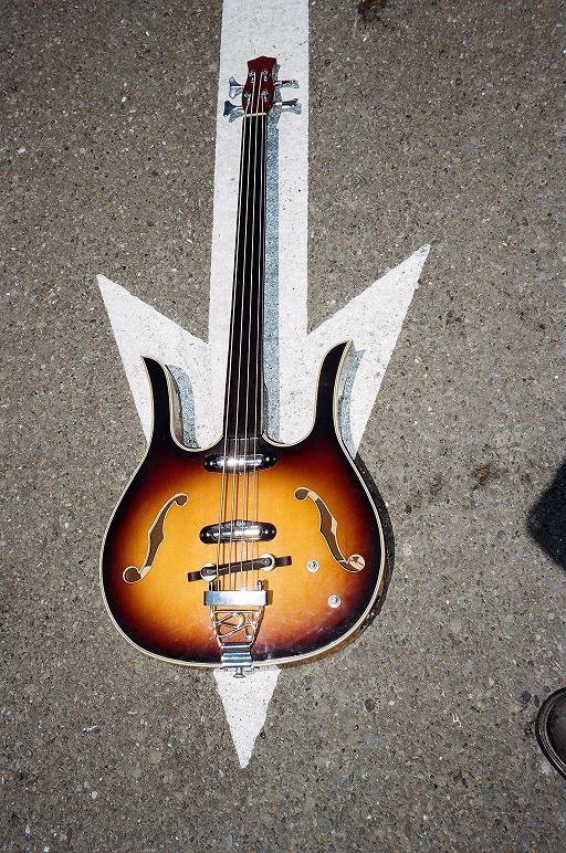 Sub-Coral fretless longhorn $375