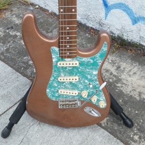 Subway Guitars strat copper tone with green pearl pickgard $275
