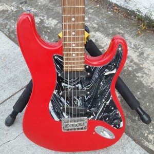 Red stratford baritone with emg pickups battery powered